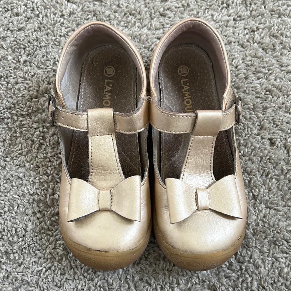 Girls Gold L’Amour Bow shoes, size 12.